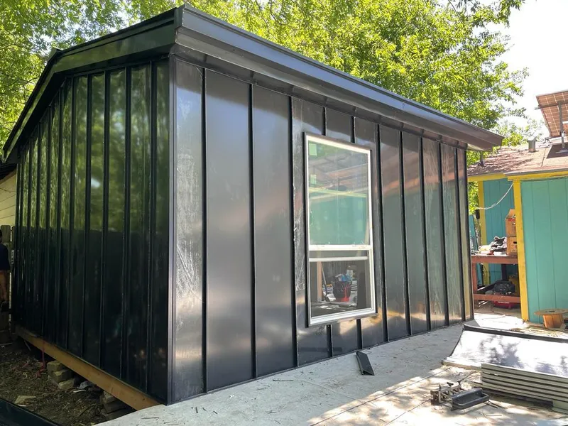 Black standing seam metal wall panels for Metal Roof Installation in Blaine